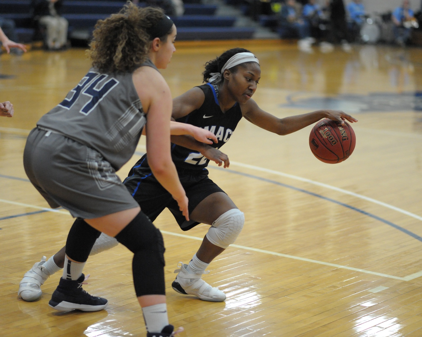 Aliyah Robinson keeps ball from defender